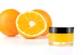 Natural orange sugar lip scrub on white.