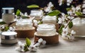 Natural and organic cosmetics in open jars against the backdrop of blooming cherry flowers, Generative AI