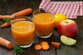 Natural organic fresh juice made of carrots and apples Royalty Free Stock Photo