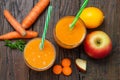 Natural organic fresh juice made of carrots and apples Royalty Free Stock Photo