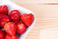 Natural organic strawberries bowl wooden background Royalty Free Stock Photo