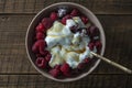 Natural organic yogurt with fresh red raspberries and cottage cheese for breakfast, top view, close up Royalty Free Stock Photo