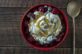 Natural organic yogurt with fresh red raspberries and cottage cheese for breakfast, top view, close up Royalty Free Stock Photo