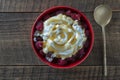 Natural organic yogurt with fresh red raspberries and cottage cheese for breakfast, top view, close up Royalty Free Stock Photo