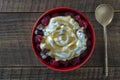 Natural organic yogurt with fresh red raspberries and cottage cheese for breakfast, top view, close up Royalty Free Stock Photo