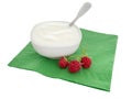 Natural organic yogurt, yoghourt on green napkin with raspberri