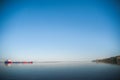 Natural panorama of the river, texture. Steamboat, a tugboat on the water against a rock background. Cliff Stepan Razin, Volgograd Royalty Free Stock Photo