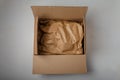 Natural paper package, carton on white background. Eco-friendly, no plastic product parcel wrapping. Care for environment,