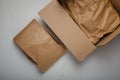 Natural paper package, carton on white background. Eco-friendly, no plastic product parcel wrapping. Care for environment,