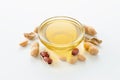 Natural peanut oil in a bowl with peanuts Royalty Free Stock Photo