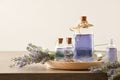 Natural perfume with lavender essence in glass bottles front view