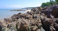 Large Rocks Pile Up Naturally On The Edge Of Your Cape Beach Royalty Free Stock Photo