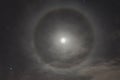 Natural phenomenon in the night sky. Moon halo Royalty Free Stock Photo