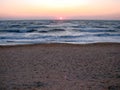 Natural picture of the rainbow colors of sunrise on the coast of the Azov Sea. Royalty Free Stock Photo