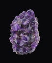 Natural piece of amethyst crystal isolated.