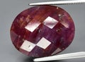 Natural pink tourmaline gem on the background Royalty Free Stock Photo