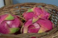 Natural pitaya fruits Cereus undatus in wooden basket Royalty Free Stock Photo