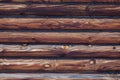 Natural planed wood texture. Rustic round painted log wall horizontal background Royalty Free Stock Photo