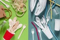 Natural and plastic disposable tableware on a blue and gray background.