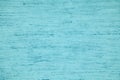 Natural plywood background painted blue solid color with brush strokes, new and clean