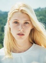 Natural portrait of a beautiful young girl close-up. Close up portrait of young beautiful redhead girl, cute beautiful Royalty Free Stock Photo