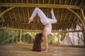 Natural portrait of young attractive and happy relaxed woman doing yoga and meditation exercise working body and mind balance Royalty Free Stock Photo