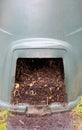 Natural, processed homemade compost in a plastic barrel