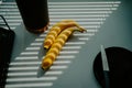 Natural radiance showcases a banana on the kitchen tabletop Royalty Free Stock Photo