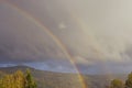 Natural rainbow and cloudy sky