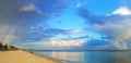 Natural rainbow over the beach Royalty Free Stock Photo