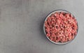 Natural raw ingredients for pet food on grey background. Royalty Free Stock Photo