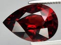 natural red garnet almandine gem on the background Royalty Free Stock Photo