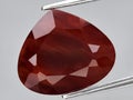 natural red orange andesine gemstone on the background Royalty Free Stock Photo