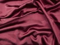 Natural red satin fabric texture background Royalty Free Stock Photo