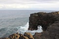 Natural rock arch on the Hawaiian coast Royalty Free Stock Photo