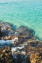 Natural rocks and clear blue waters at Kleopatra beach, Alanya