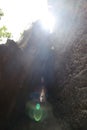 Natural rocks under the cliff with light flare in Diamond Beach, Nusa Penida Island