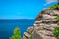 Natural rocky cliff, landscape view above tranquil azure blue water at beautiful, inviting Bruce Peninsula, Ontario