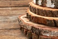 Natural round wood slices with bark.