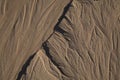 Natural sand pattern created by a flow of tide and ripples Royalty Free Stock Photo