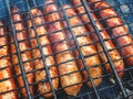 Natural sausages fried on the grill. BBQ Royalty Free Stock Photo