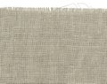 Natural simple coarse linen fabric - canvas. Royalty Free Stock Photo