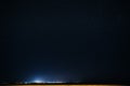 Natural Sky Background Over Rural Countryside Landscape. Night Starry Sky Above Village. Night Time