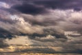 Natural sky composition. Dark ominous colorful storm rain clouds. Dramatic sky. Overcast stormy cloudscape. Thunderstorm