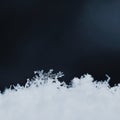 Natural snowflakes on snow, photo real snowflakes-Beautiful macro shot on winter and Christmas season. Royalty Free Stock Photo