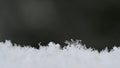 Natural snowflakes on snow, photo real snowflakes-Beautiful macro shot on winter and Christmas season.