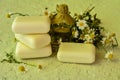 Bar of natural handmade soap and chamomile