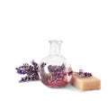 Natural soap, lavender flowers and flask isolated on white Royalty Free Stock Photo