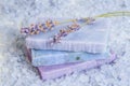 Natural soap, lavender, salt on a wooden board, hygiene items for bath and spa. Royalty Free Stock Photo