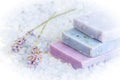 Natural soap, lavender, salt on a wooden board, hygiene items for bath and spa. Royalty Free Stock Photo